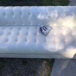 PEARL LEATHER TUFTED COUCH 