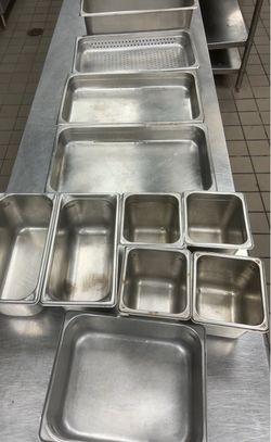 Up for sale  lot of Stainless steel restaurant containers
