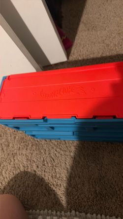 Box with a bunch of hotwheels