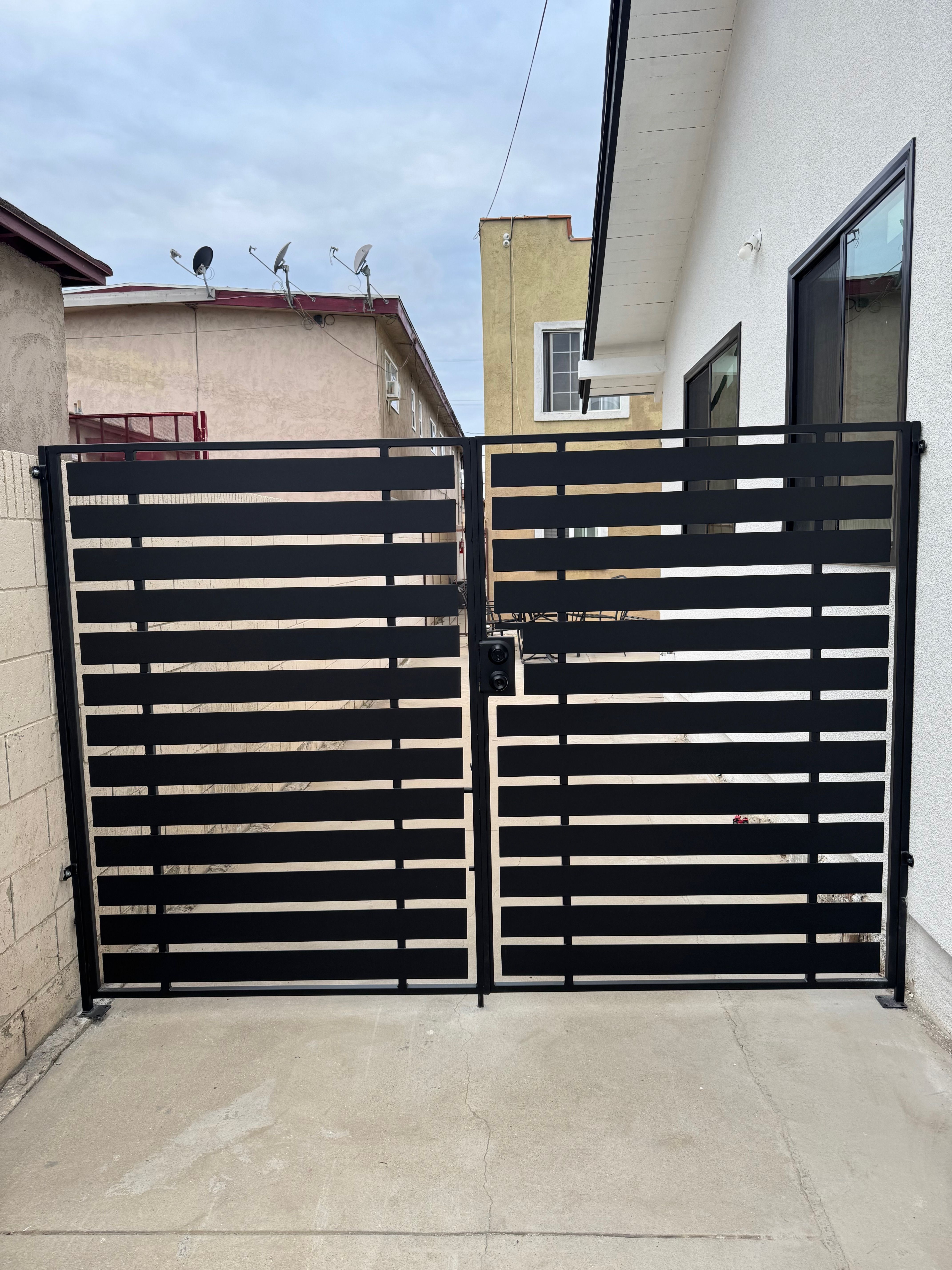 Double Iron Gate with Horizontal Slat Design