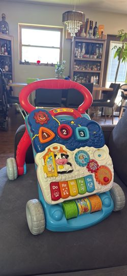 V Tech Sit to Stand Baby Walker