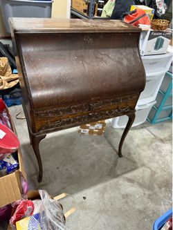 Broken roll top desk
