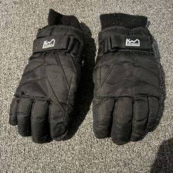 Outback ski gloves with adjustable straps. Kids Large 