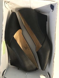 Women’s size 9 black wedge shoes. New in box$25 or best offer