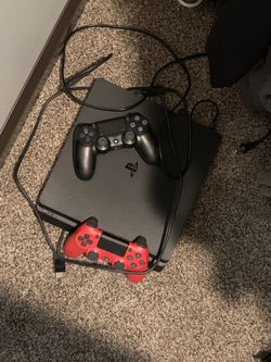 PS4 with games and 2 DualShock controllers