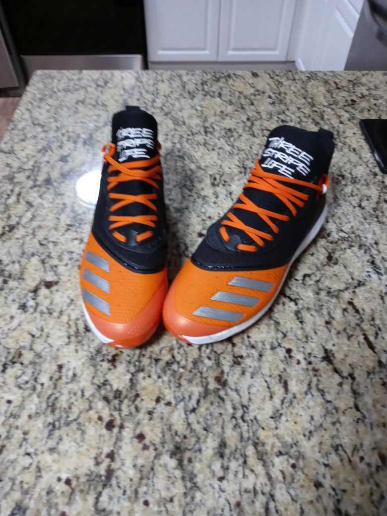 Adidas Icon V Boost metal cleats. Black and orange mens size 12