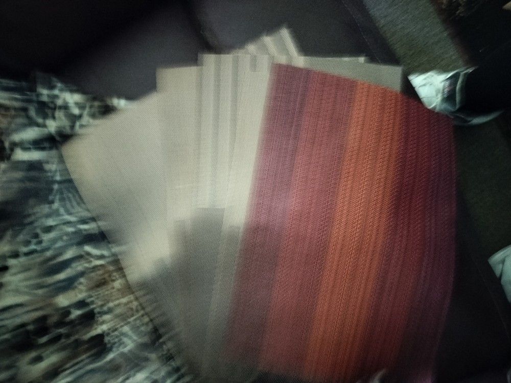 A Set Of Eight Table Placemats