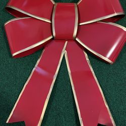 Red metal bow door decor 