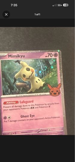 Mimikyu Holo Pokémon Trading Card with holo swirls