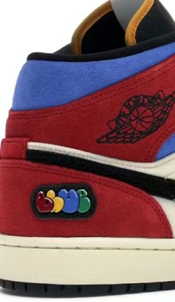 Blue The Great x Air Jordan 1 Mid 'Fearless'.Design Collaboration: Designed with Los Angeles-based co artist Blue the Great.Collection: Part of Nike’s