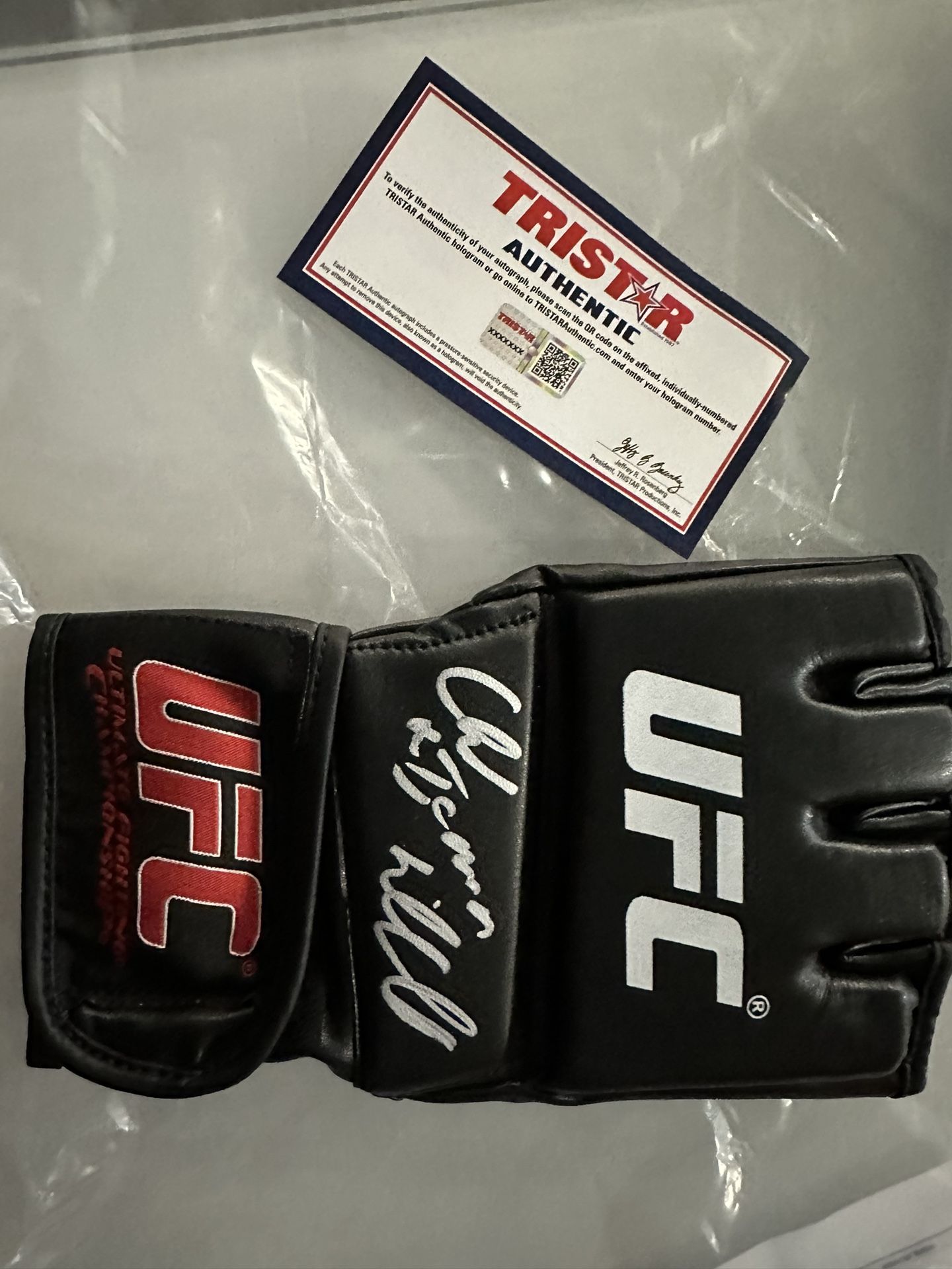 Autographed UFC glove - Chuck “the Iceman” Liddell