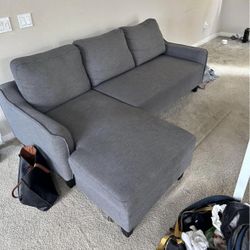 Gray Jarreau Sleeper Chaise 83” Sectional Sofa by Ashley HomeStores