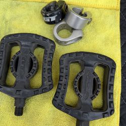 GT Bmx parts clamps and pedals.