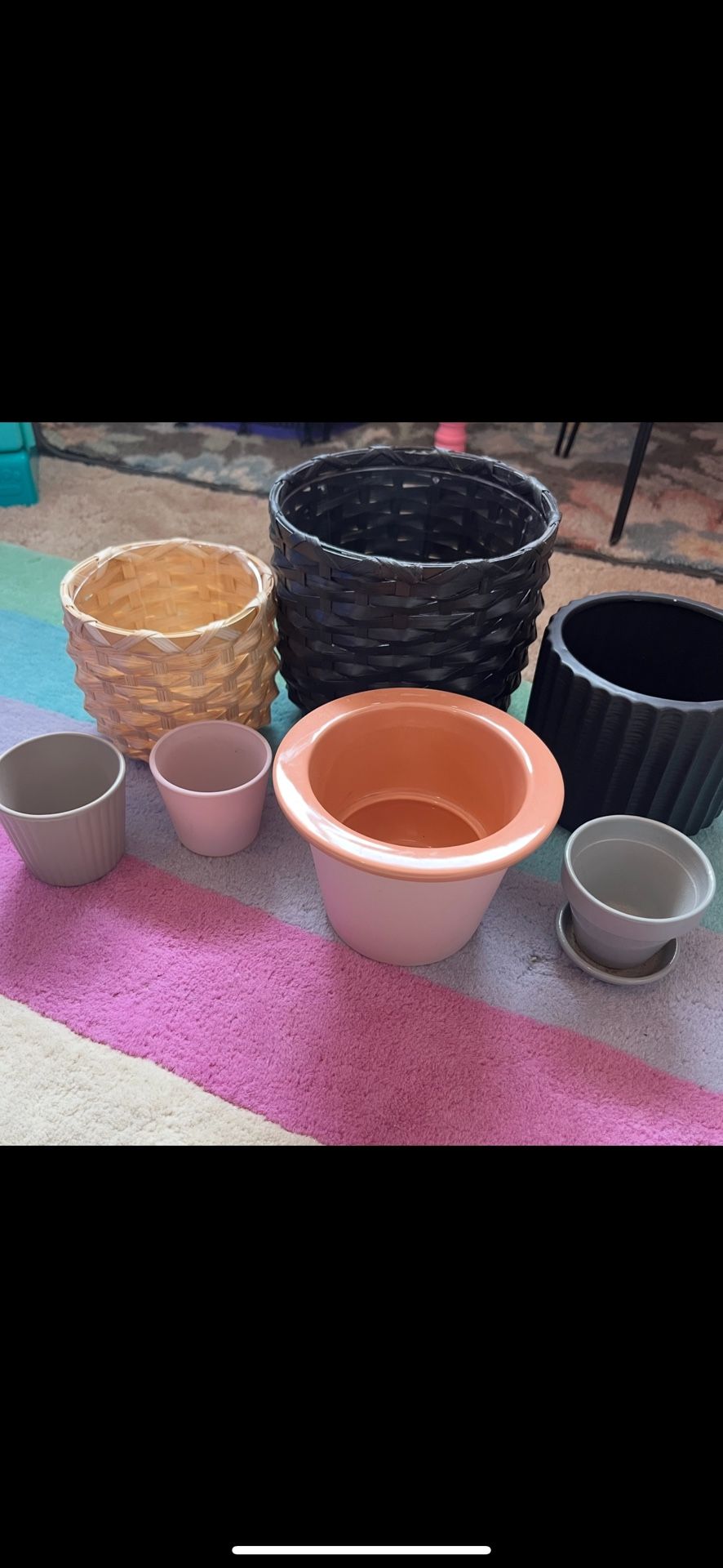Miscellaneous small plant pots. A few little chips in some of the ceramic ones. $15
