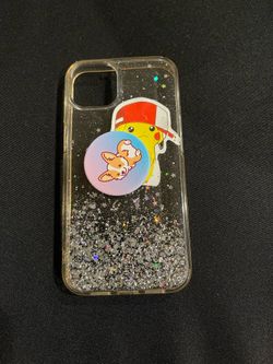 iPhone 13 phone case with pop socket and silver glitter. Sticker and pop socket can be removed - used