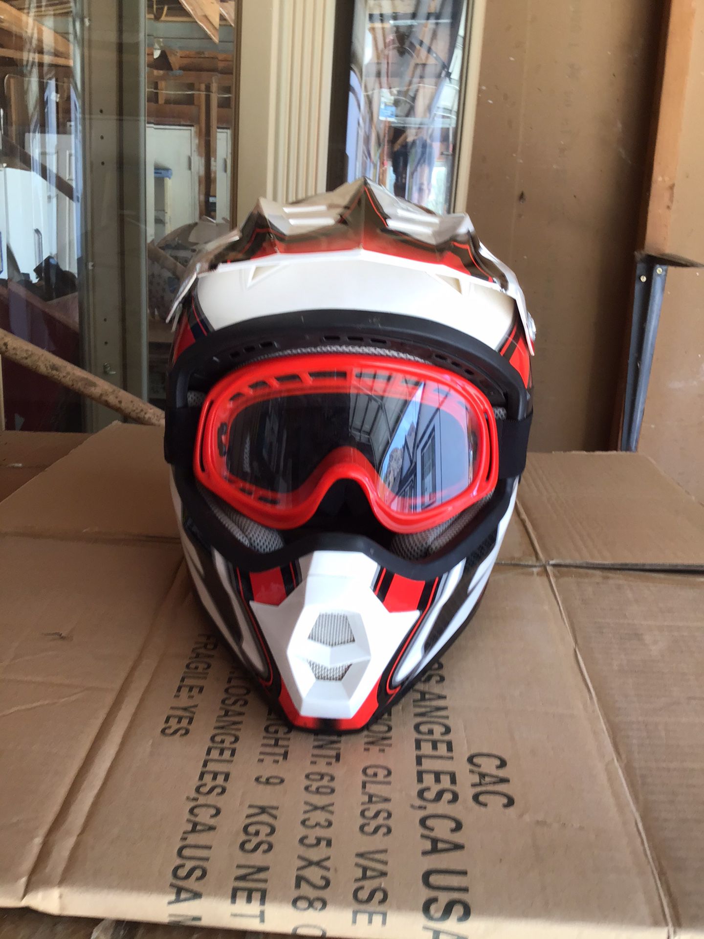 Brand New dirt bike helmet and goggles