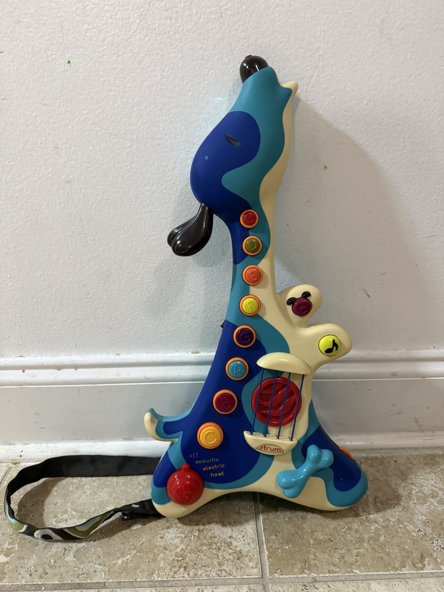B. toys Interactive Dog Guitar - Woofer