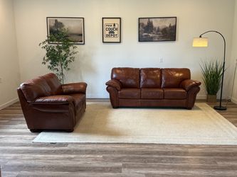 Brown leather couch & loveseat delivery available