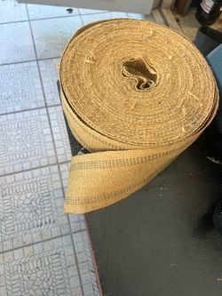 Roll This is jute webbing, often used in upholstery for repairing furniture seats.