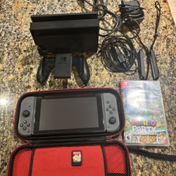 Nintendo Switch Like New/ Case/ 2 Games 