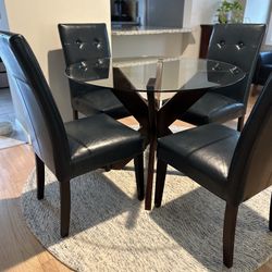 Glass Dining Room Table With Navy Blue Leather Chairs 