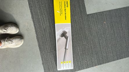 Never used- hoto cordless spin scrubber