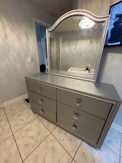 silver dresser with mirror included