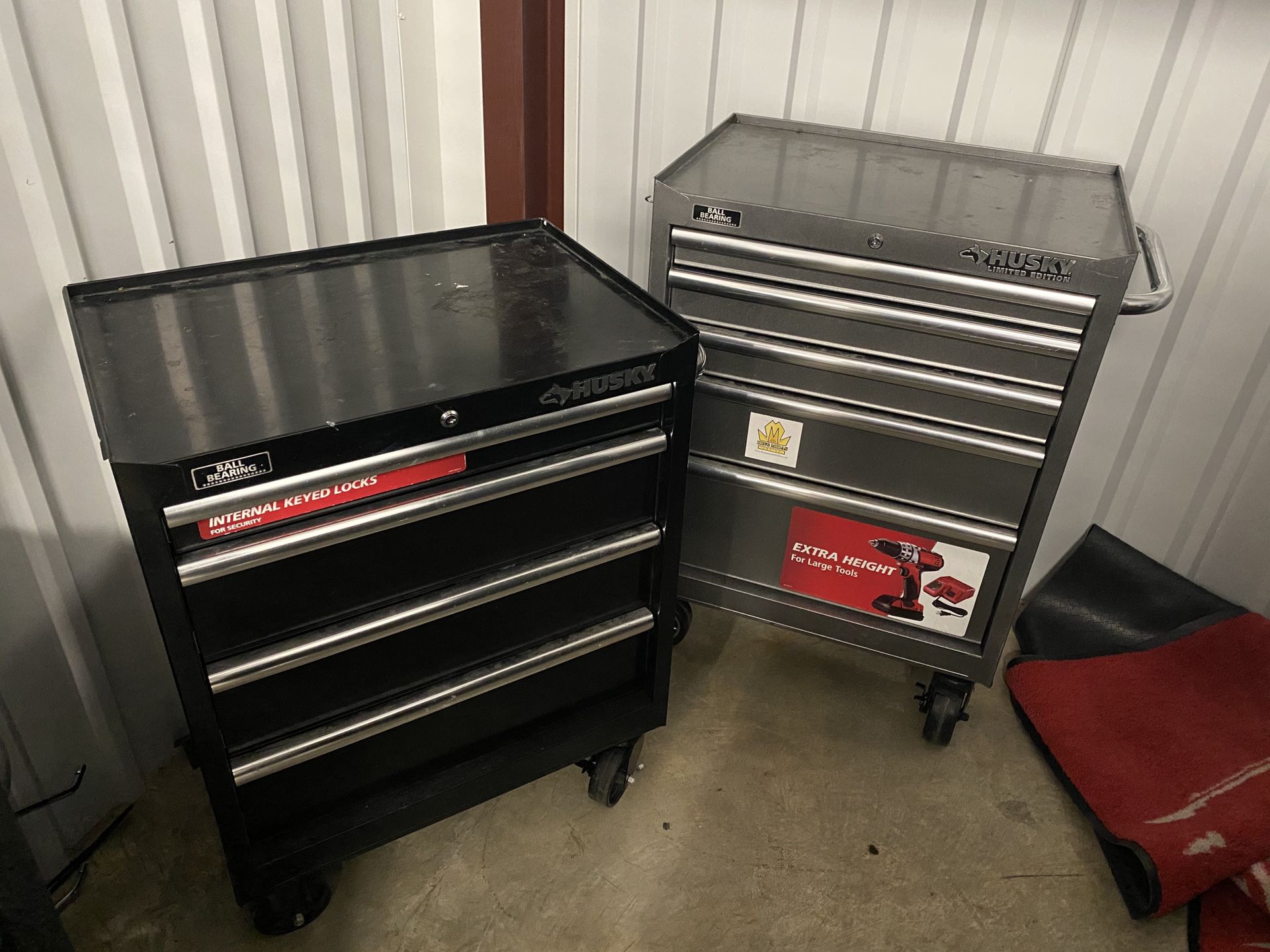 3 black and 1 gray tool boxes
