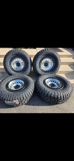 17" KMC w- 35" RT.   BRAND NEW