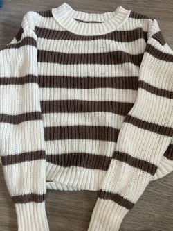white and brown sweater