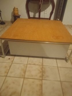 Coffee table that has a slide table good condition $35