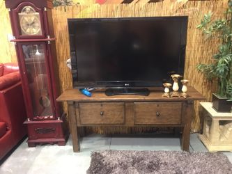 55 inch LG TV with Havertys stand