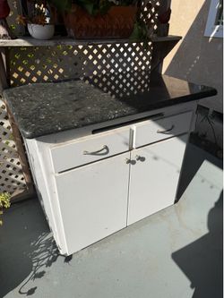 Kitchen or Garage End Cabinet with granit counter top