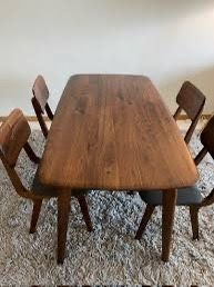 castlery vincent dining table walnut wood 59 inch retails new 799 plus tax like new Does have 2 small defects in wood on top of table see pics W59"