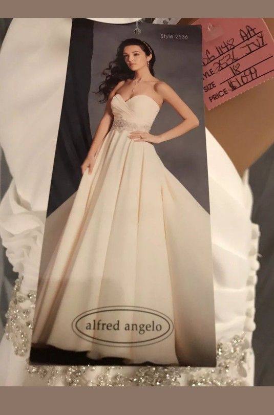 Size 16 Unaltered Wedding Dress.