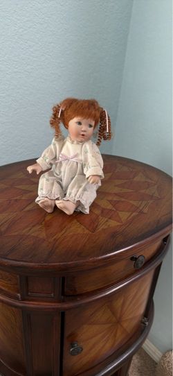 Porcelain Baby Doll with Red Hair
