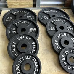 NEW complete set of 45,35,25,10lb iron olympic plates EVERYTHING NEW IN BOX $230  