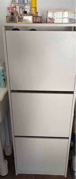 Shoe storage pivot open