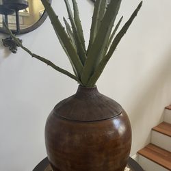 Decorative wood vase or pot, possibly hand-turned.