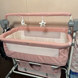 Pink Foldable Rocking Bassinet