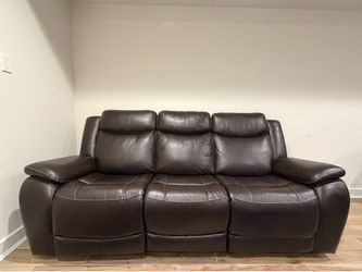 Power reclining sofa with power headsets