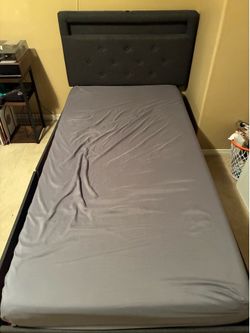 Twin sized bed with memory foam mattress