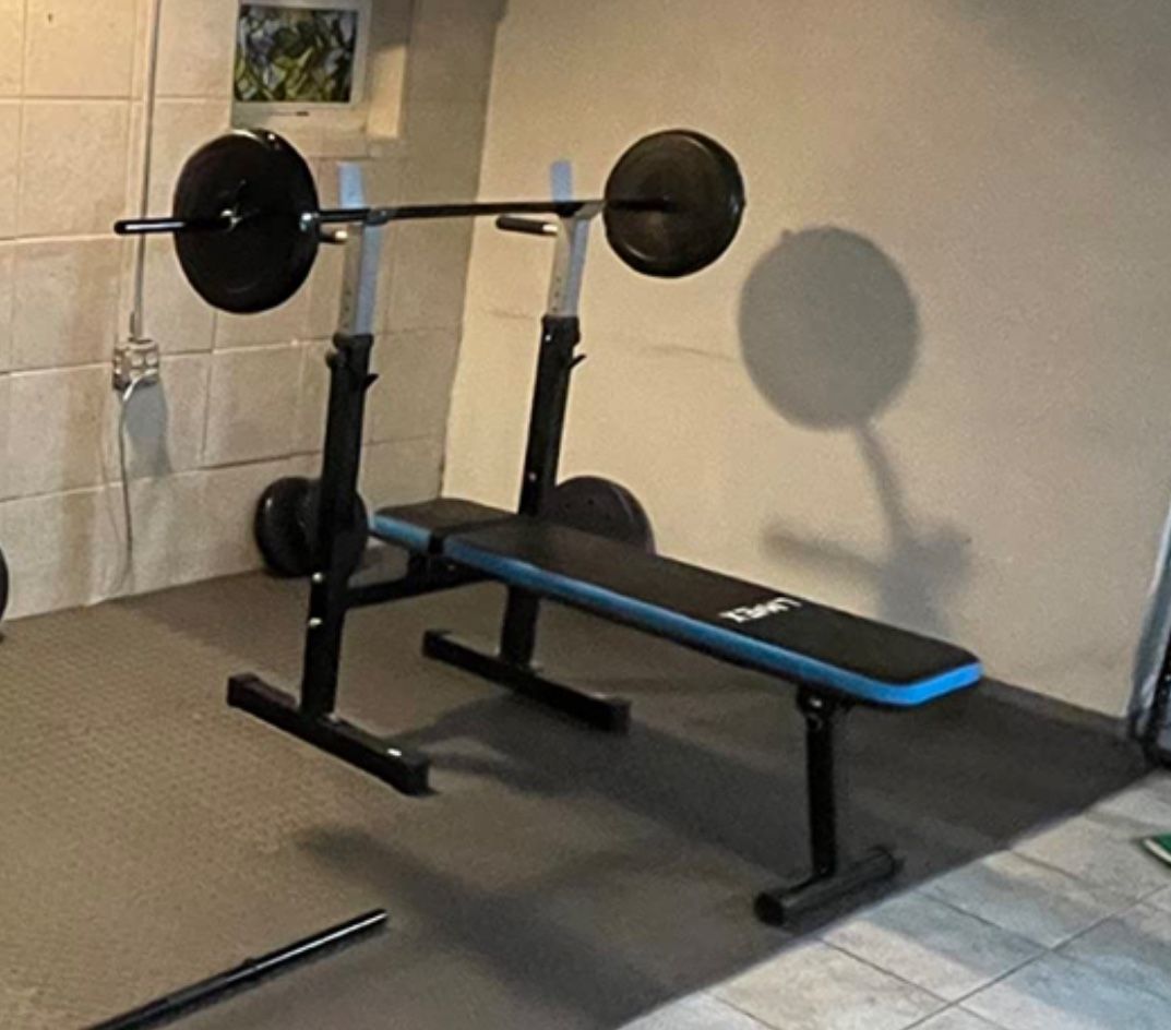 Bench press With Bar And 40lbs Of Weights