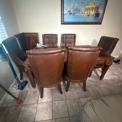 Traditional-style rectangular dining table with carved detailing
