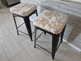 24in metal and faux cowhide print bar stools