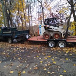 2,000 GMC Truck -2,000 Bobcat-2,000 Trailer