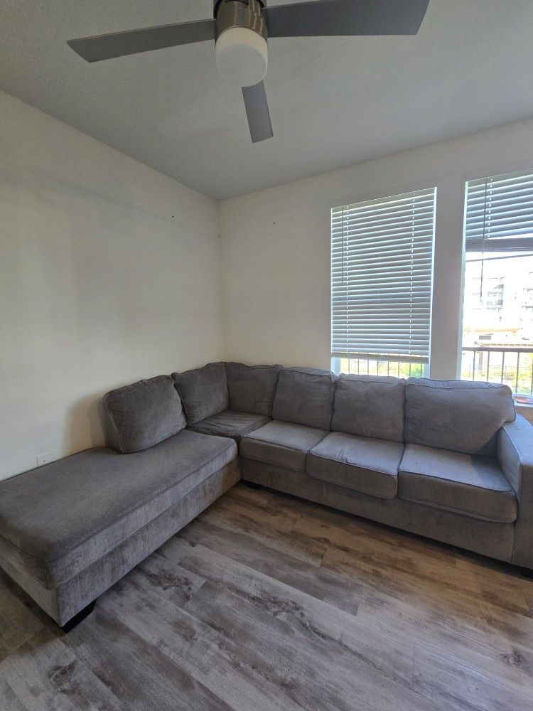 Gray L sectional Couch.