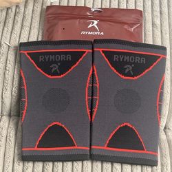 A PAIR OF ELBOW COMPRESSION SLEEVES IN A LARGE SIZE FOR PAIN RELIEF ARTHRITIS OR SUPPORT