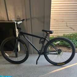 Large black throne BMX bike 29’ Wheel
