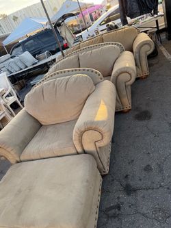 Beige Nailhead Trim Sofa loveseat and oversized chair with ottoman